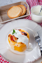 Yellow stuffed pepper with chicken meat dressing with cream