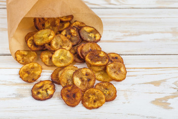 Homemade crispy Banana chips. Vegeterian and vegan concept.