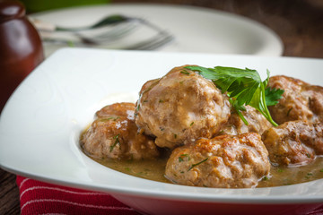 Pork meatballs with dill sauce.