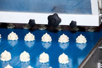 Biscuit depositing machine