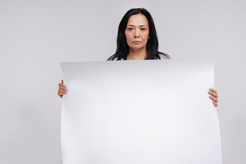 Beautiful woman of Asian origin working for social advertisement