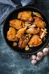 Crispy, Fried chicken stew. Skillet Fried chicken with vegetable. 