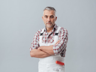 Painter posing with arms crossed © stokkete