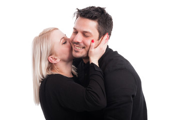 Happy loving female kissing her boyfriend
