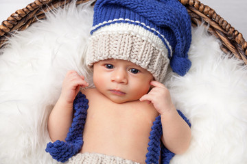 Beautiful newborn inside a basket