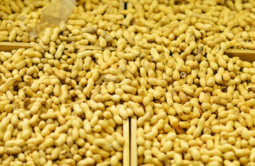 A bunch of Peanut shells in grocery store.