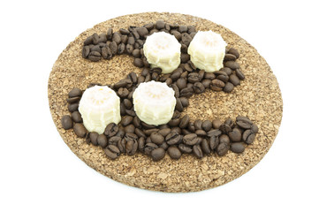 Pieces of chocolate and coffee beans