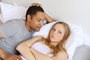 Fototapeta premium Woman avoiding partner - Withholding sex