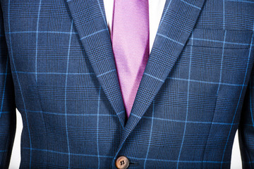 Detail of a blue suit jacket on a man