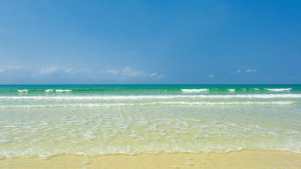 Beautiful gentle wave and bright water at the tropical beach