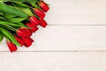 Spring Tulip Flowers on White Wooden Background