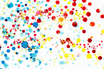 Fototapeta na wymiar Abstract multicolor background. Bubbles of paint and ink on a white, pattern of drop.
