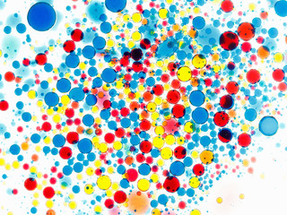 Abstract multicolor background. Bubbles of paint and ink on a white, pattern of drop.