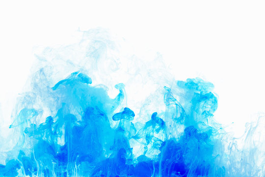 Abstract background color ink drop in water. Blue cloud of paint on white.