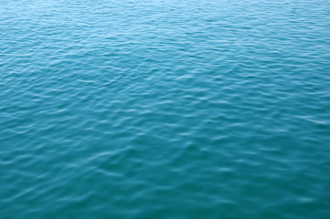 Blue sea surface with waves