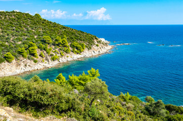Fototapeta na wymiar Blue Greece coast in summer