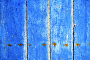 stripped paint  the blue  and rusty nail