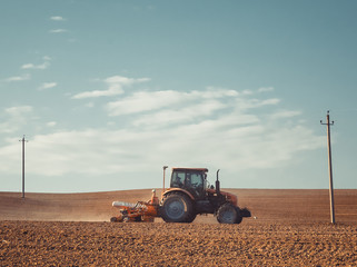Obraz premium Tractor in a field