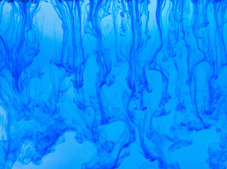 Blue smoke abstract background. Color ink or paint drop in water.