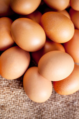  Eggs on wooden  background closeup