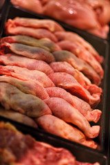 Heap of fresh raw meat food flesh background at shop supermarket