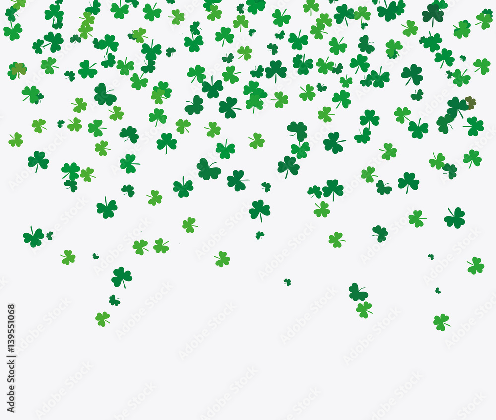 Wall mural flying leaves of clover different shades of green on a light background. pattern for st. patrick's d