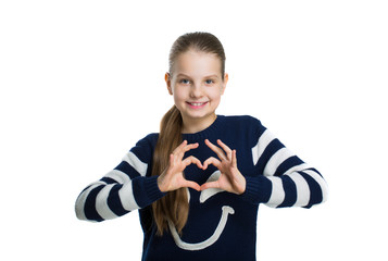 Pretty teen girl holding hands heart.