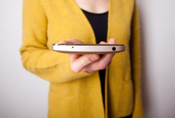 smartphone in a woman's hands