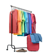 Mobile rack with colorful clothes and a suitcase on white background. File contains a path to isolation.