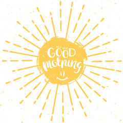 Good morning. Vector hand drawn lettering with sun and vintage sunburst. Inspirational poster.