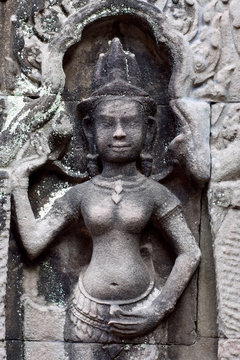 Ancient bas-relief with Apsara in Angkor temple, Cambodia