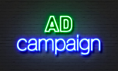 Fototapeta na wymiar Ad campaign neon sign on brick wall background.
