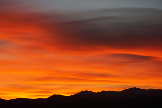 Rocky Mountain Silhouette with nature's choice of colors for a Colorado sunset