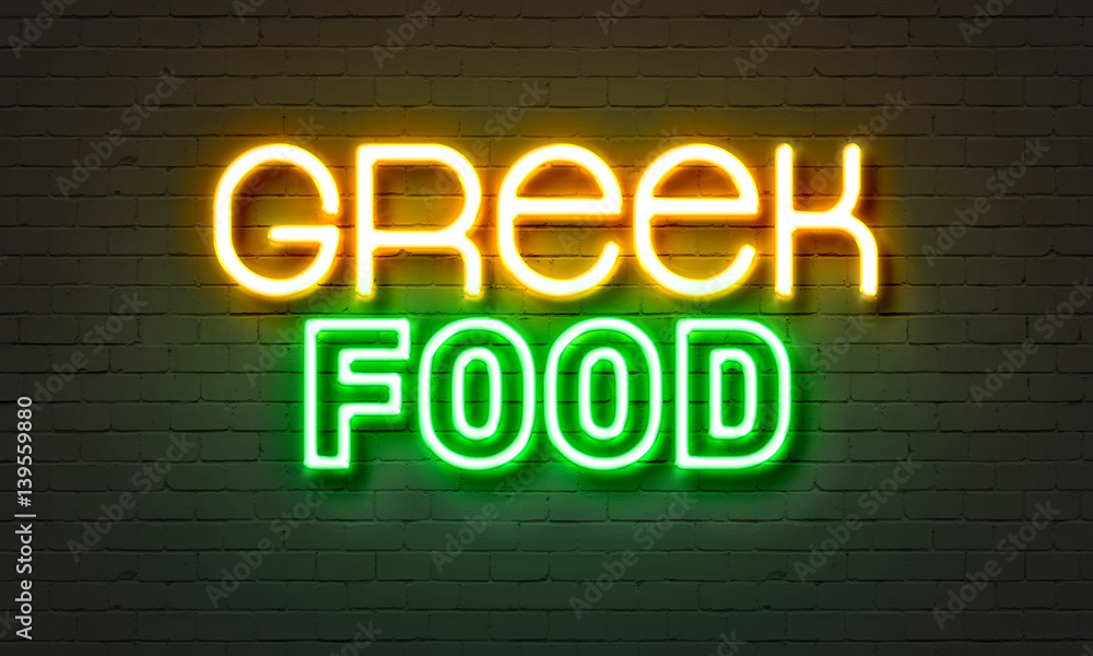 Wall mural Greek food neon sign on brick wall background.