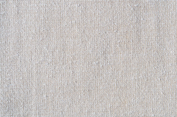 Closeup white or light beige color fabric texture. Fabric pattern design or upholstery abstract background..