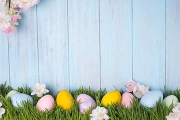 decorated easter eggs in the grass