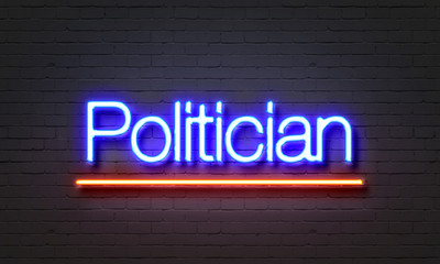 Politician neon sign on brick wall background.