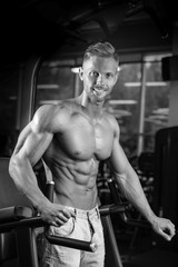 Fototapeta na wymiar Brutal caucasian handsome fitness men on diet training chest pumping