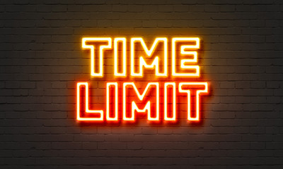 Time limit neon sign on brick wall background. - obrazy, fototapety, plakaty