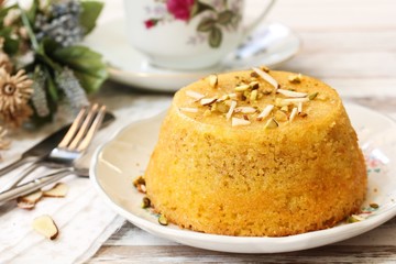 Gluten free Almond cornmeal cake topped with nuts, selective focus