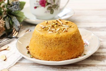 Gluten free Almond cornmeal cake topped with nuts, selective focus