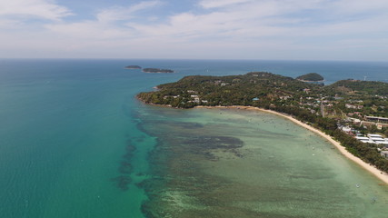 Aerial drone photo of the sea and coastline of Rawai beach in Phuket, Thailand