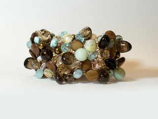 Ethnic bracelet hand plastic multi-colored stones