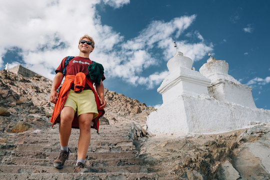 Young tourist man visit the tibetian holy places in Himalaya mountain