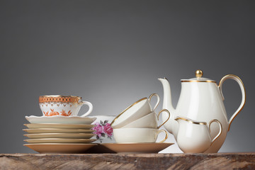 Vintage Tea Cups on a wooden Table - Gray Background - Horizonzal, Simple Studio Still-life