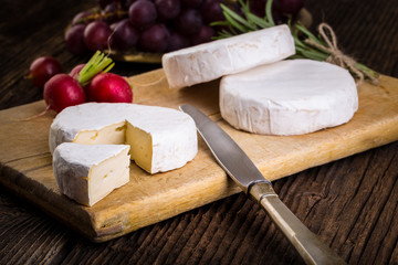 Cheese, radish, grapes and herbs