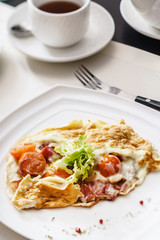 omelet with vegetables and ham