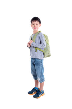 Young Asian Boy With Backpack Over White Background