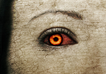 Evil bloody female zombie eyes. dirt make up. Macro. Halloween theme