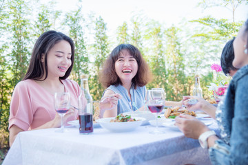Ypung asian women having lunch with her friend at restaurant